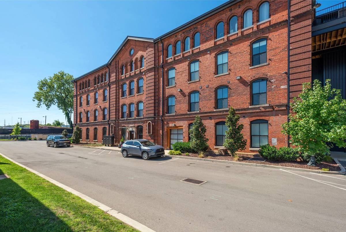 Exterior Charm: Historic brick façade invites you to explore the vibrant heart of Nashville!