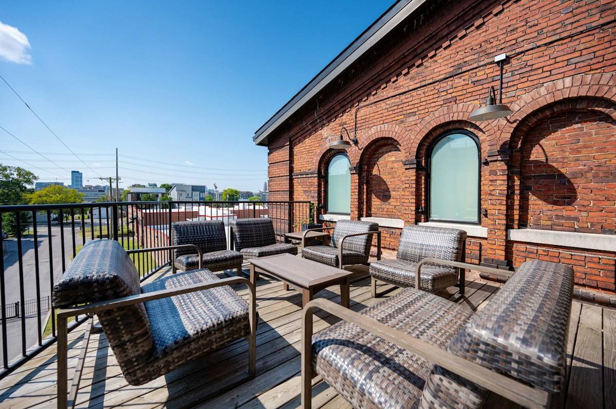 Unwind with city views in stylish seating under a sunny Nashville sky!
