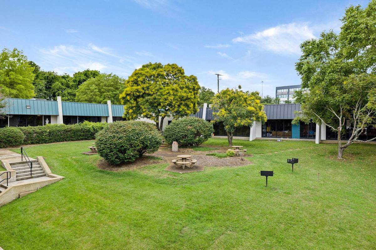 Discover the perfect harmony of productivity and tranquility, where guests find inspiration amidst lush greenery, fostering a serene and conducive environment for work and relaxation."