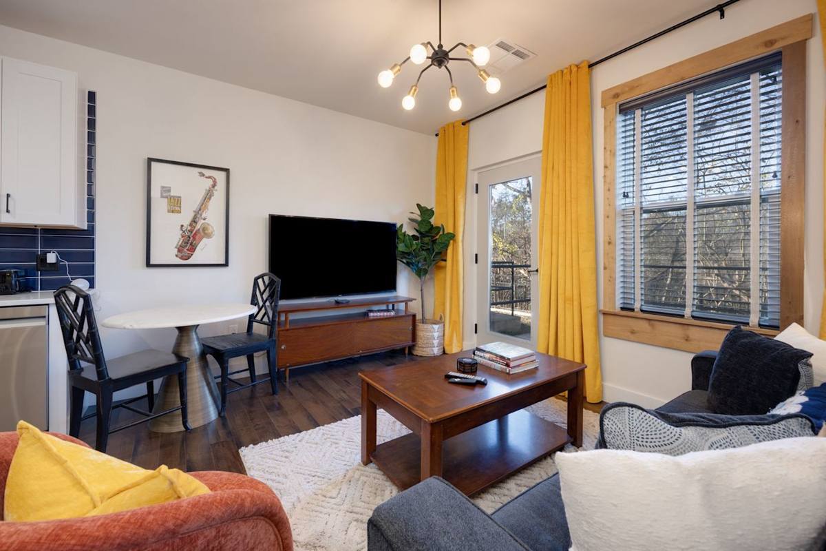 Living Room: Bright and lively space with chic decor that invites relaxation and fun gatherings!