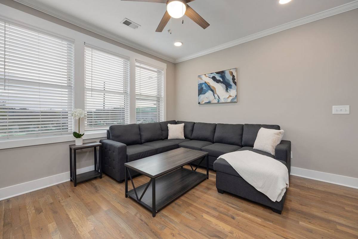 Modern space with vibrant city views and sleek furnishings for ultimate relaxation!