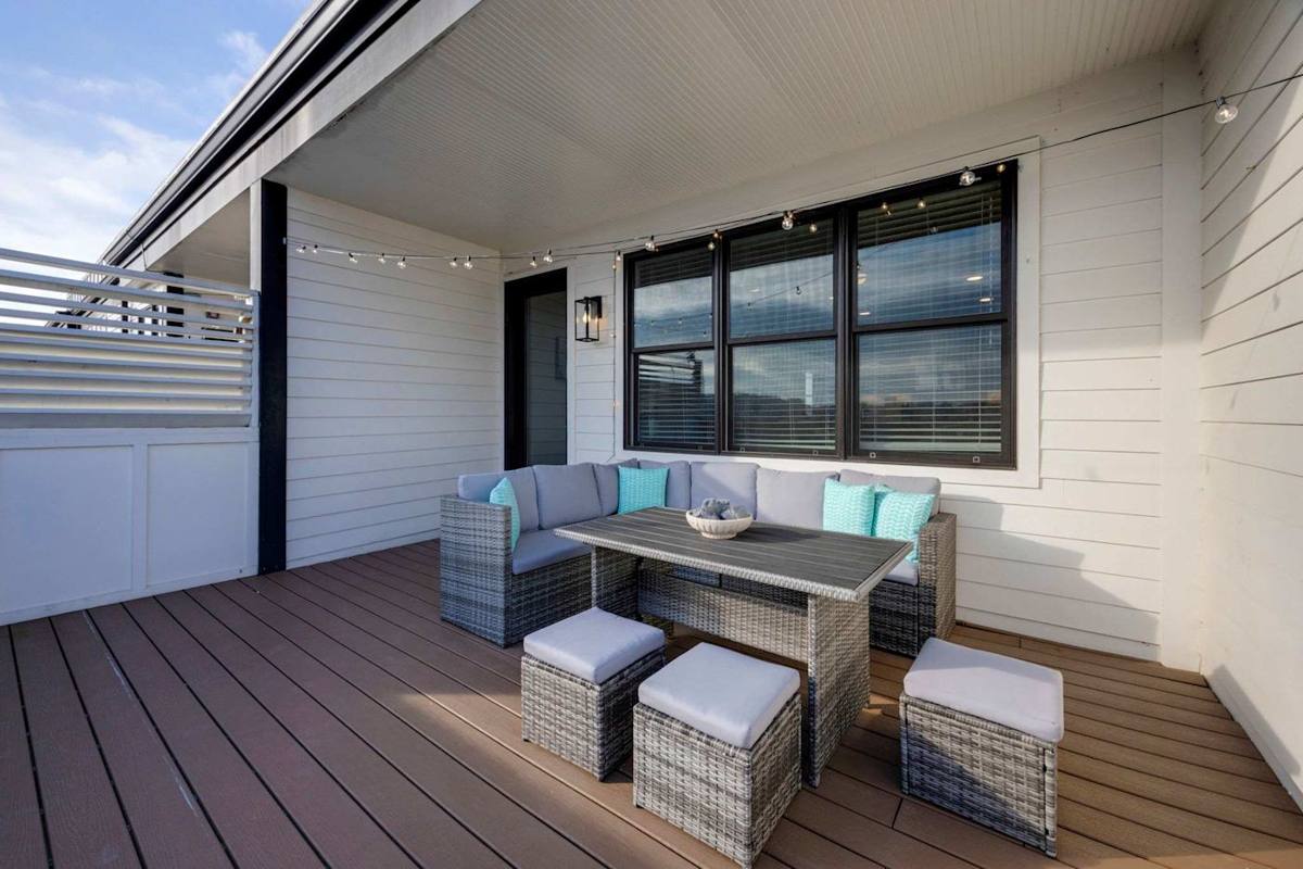 Enjoy stunning views and string lights on this inviting outdoor space!
