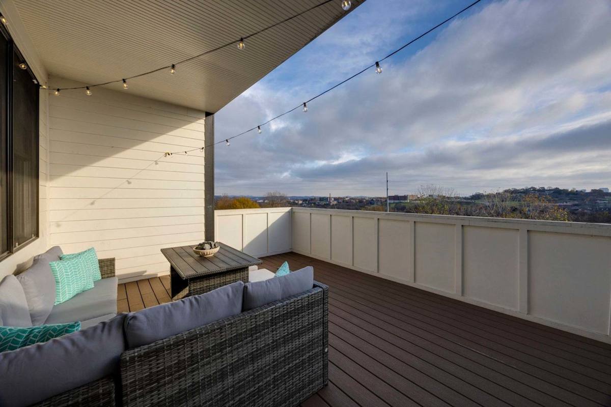Enjoy stunning views and string lights on this inviting outdoor space!