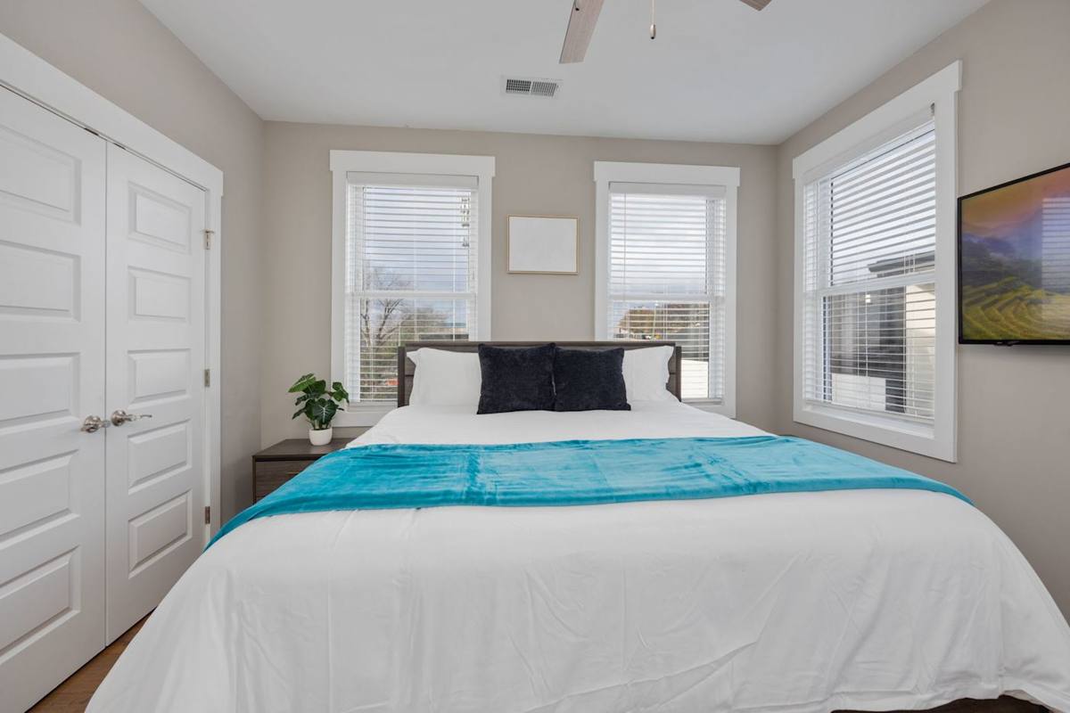 Bright and stylish retreat with views, modern furnishings, and a sleek TV!