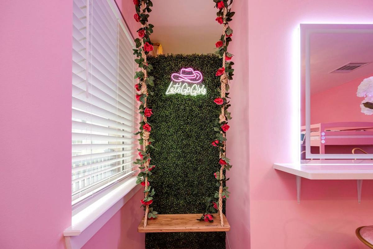 Step into fun with vibrant decor and a swing, inviting smiles and memories!