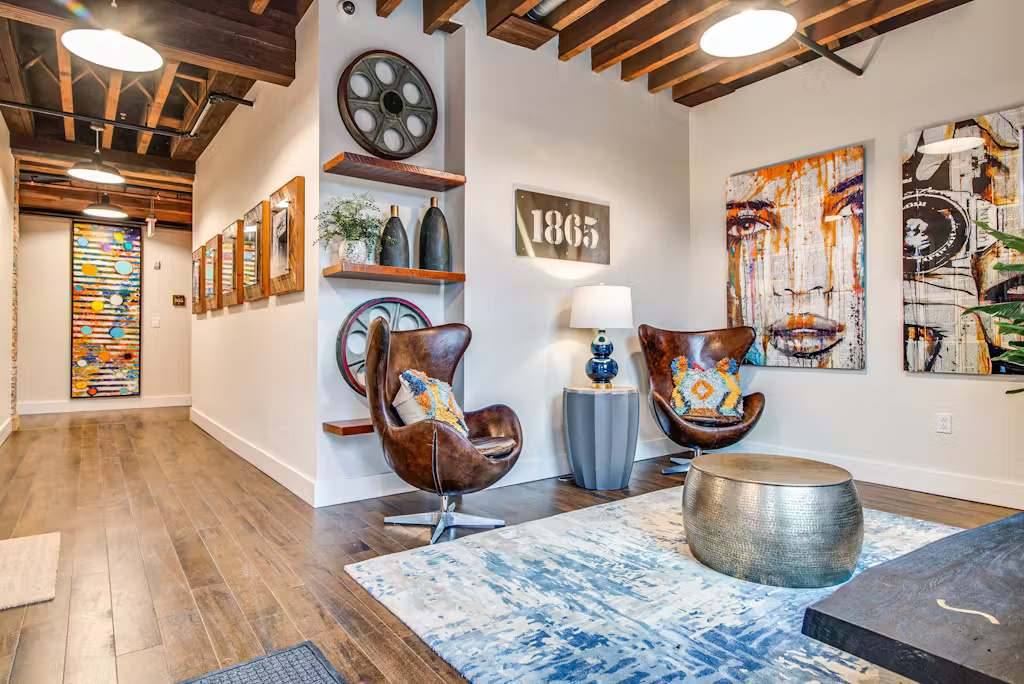 Discover vibrant art and stylish seating in this trendy Nashville retreat!